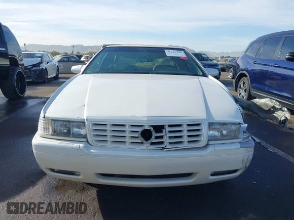 2001 Cadillac Eldorado Touring ETC z VIN 1G6ET12991B104624, wystawiony jako IAAI lot #41616324 z przebiegiem Nie podano mil oraz . Historia ofert i sprzedaży dostępna na DreamBid. Obrazek 12.
