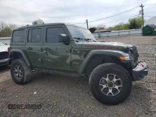 2021 Jeep Wrangler Unlimited Rubicon with VIN 1C4JJXFM3MW555919, listed as a Copart auction lot 54319775 with 51,188 mi miles and Salvage title. Bid and sale history available at DreamBid. Image 4.