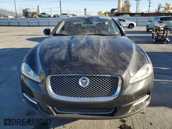 2013 Jaguar XJ with VIN SAJWA2GB0DLV43865, listed as a Copart auction lot 79693934 with 0 mi miles and Salvage Title. Bid and sale history available at carsss.com. Image 5.