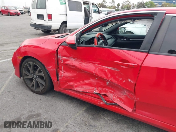 2019 Honda Civic Sport with VIN 2HGFC2F8XKH585650, listed as a IAAI auction lot 42043354 with 116,412 mi miles and . Bid and sale history available at DreamBid. Image 6.