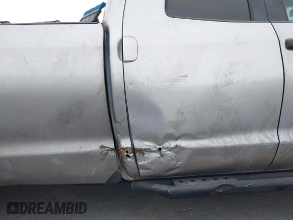 2012 Toyota Tundra 4WD Truck SR with VIN 5TFCW5F19CX012832, listed as a IAAI auction lot 41726453 with 232,078 mi miles. Bid and sale history available at carsss.com. Image 6.