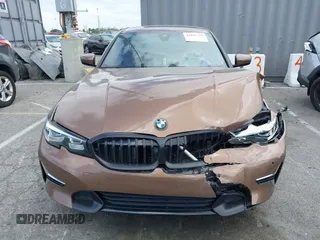 2019 BMW 3 Series 330i with VIN WBA5R1C57KAK07519, listed as a IAAI auction lot 42042379 with 40,898 mi miles and . Bid and sale history available at DreamBid. Image 12.