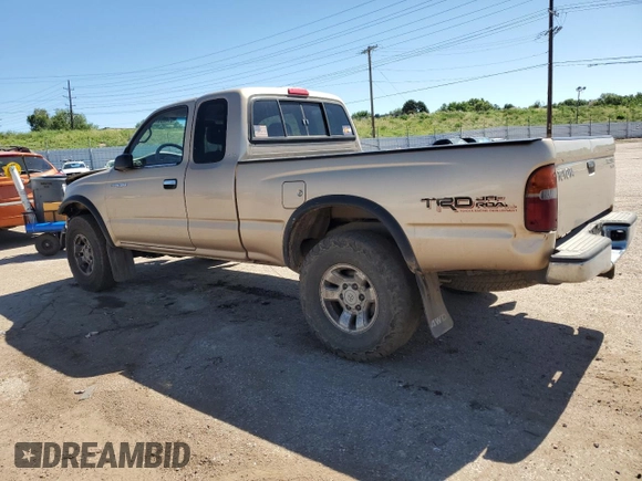 1999 Toyota Tacoma with VIN 4TAWN72N4XZ560411, listed as a Copart auction lot 61499925 with 395,215 mi miles and Salvage title. Bid and sale history available at DreamBid. Image 2.
