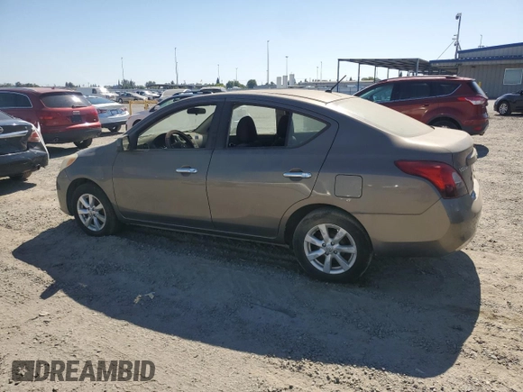 2012 Nissan Versa SV with VIN 3N1CN7AP1CL812288, listed as a Copart auction lot 63996355 with 128,229 mi miles and Clean title. Bid and sale history available at DreamBid. Image 2.