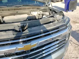 2025 Chevrolet Tahoe LT z VIN 1GNS5NRD7SR148973, wystawiony jako Copart lot #69501545 z przebiegiem 14 342 mil mil oraz Szkoda całkowita • Salvage title. Historia ofert i sprzedaży dostępna na DreamBid. Obrazek 17.