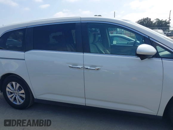 2016 Honda Odyssey SE with VIN 5FNRL5H33GB043303, listed as a IAAI auction lot 42215233 with 67,097 mi miles and . Bid and sale history available at DreamBid. Image 13.