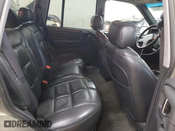 1996 Jeep Grand Cherokee Limited z VIN 1J4GZ78S5TC210710, wystawiony jako Copart lot #81307904 z przebiegiem 285 169 mil mil oraz Szkoda całkowita • Salvage title. Historia ofert i sprzedaży dostępna na DreamBid. Obrazek 11.