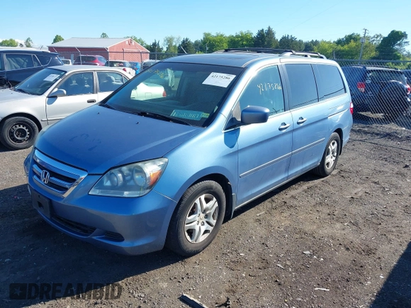 2007 Honda Odyssey EX-L with VIN 5FNRL38707B051950, listed as a IAAI auction lot 42175286 with 125,818 mi miles. Bid and sale history available at carsss.com. Image 2.