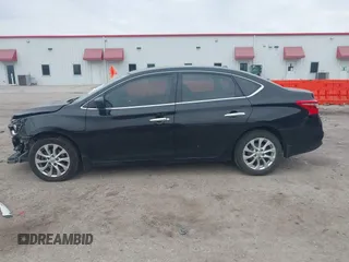2018 Nissan Sentra S with VIN 3N1AB7AP4JY258244, listed as a IAAI auction lot 41640588 with 119,803 mi miles and . Bid and sale history available at DreamBid. Image 14.