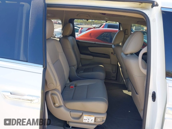 2015 Honda Odyssey Touring Elite with VIN 5FNRL5H96FB090702, listed as a IAAI auction lot 41825889 with 118,157 mi miles and . Bid and sale history available at DreamBid. Image 8.