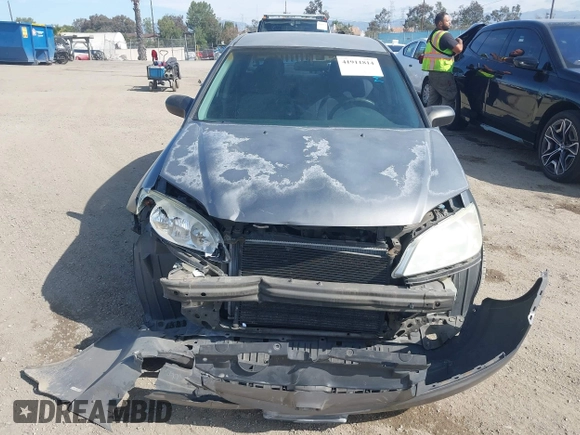2004 Honda Civic LX with VIN 2HGES16654H579927, listed as a IAAI auction lot 41911814 with 233,803 mi miles. Bid and sale history available at carsss.com. Image 12.