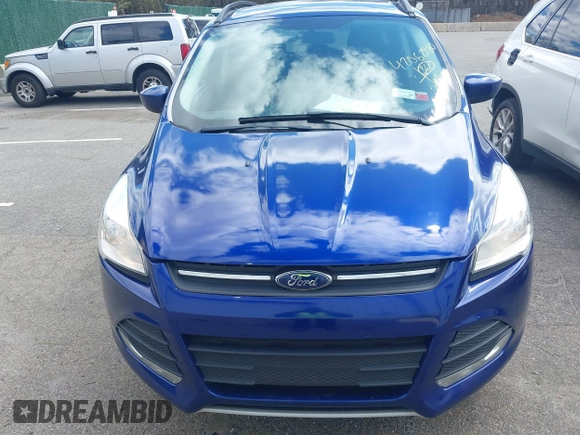 2014 Ford Escape SE with VIN 1FMCU9G93EUC54050, listed as a IAAI auction lot 42062980 with 129,015 mi miles. Bid and sale history available at carsss.com. Image 6.