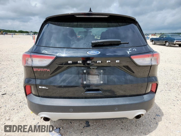 2021 Ford Escape SEL with VIN 1FMCU0H65MUA58271, listed as a Copart auction lot 63344555 with 44,850 mi miles and Salvage title. Bid and sale history available at DreamBid. Image 6.