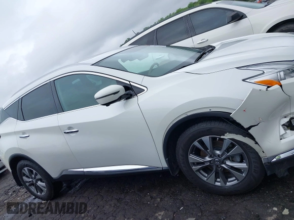 2016 Nissan Murano Platinum with VIN 5N1AZ2MG5GN126361, listed as a IAAI auction lot 41973077 with 124,624 mi miles and . Bid and sale history available at DreamBid. Image 13.
