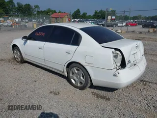 2002 Nissan Altima SL z VIN 1N4AL11DX2C279807, wystawiony jako IAAI lot #42482548 z przebiegiem 208 233 mil mil oraz . Historia ofert i sprzedaży dostępna na DreamBid. Obrazek 3.
