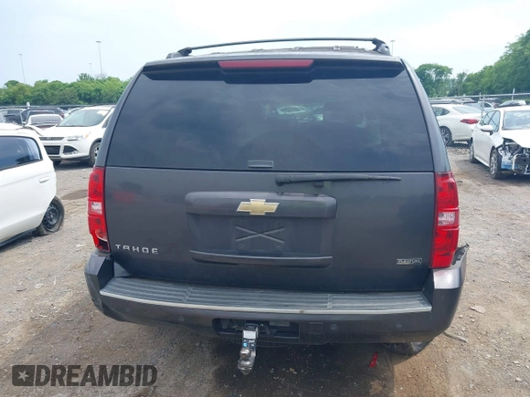 2010 Chevrolet Tahoe LT with VIN 1GNMCBE35AR247803, listed as a IAAI auction lot 42270437 with 264,187 mi miles and . Bid and sale history available at DreamBid. Image 16.