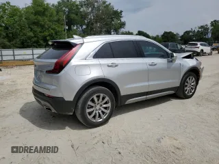 2019 Cadillac XT4 FWD Premium Luxury z VIN 1GYFZCR44KF195554, wystawiony jako Copart lot #55728095 z przebiegiem 35 948 mil mil oraz Nie do naprawy. Historia ofert i sprzedaży dostępna na DreamBid. Obrazek 3.