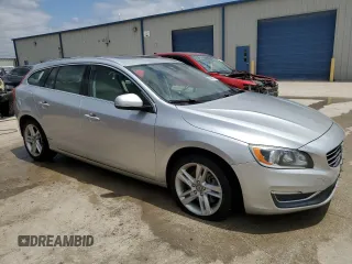 2015 Volvo V60 z VIN YV1612SC1F1191466, wystawiony jako Copart lot #64906184 z przebiegiem 89 444 mil mil oraz Szkoda całkowita • Salvage title. Historia ofert i sprzedaży dostępna na DreamBid. Obrazek 4.