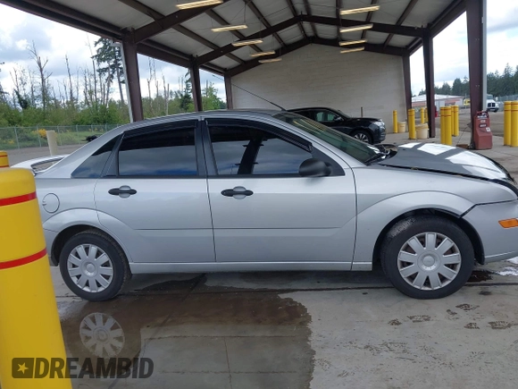 2006 Ford Focus S z VIN 1FAFP34N66W141597, wystawiony jako IAAI lot #42301819 z przebiegiem 94 705 mil mil oraz . Historia ofert i sprzedaży dostępna na DreamBid. Obrazek 14.