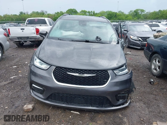 2022 Chrysler Pacifica Touring L with VIN 2C4RC1BG8NR116770, listed as a IAAI auction lot 42093616 with 98,479 mi miles and . Bid and sale history available at DreamBid. Image 12.