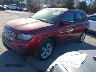 2016 Jeep Compass Latitude with VIN 1C4NJDEB1GD662807, listed as a IAAI auction lot 41161996 with 128,030 mi miles. Bid and sale history available at carsss.com. Image 16.
