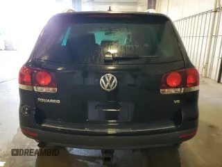 2009 Volkswagen Touareg VR6 z VIN WVGBE77L29D015958, wystawiony jako Copart lot #52019505 z przebiegiem 179 339 mil mil oraz Czysty tytuł • Clean title. Historia ofert i sprzedaży dostępna na DreamBid. Obrazek 6.