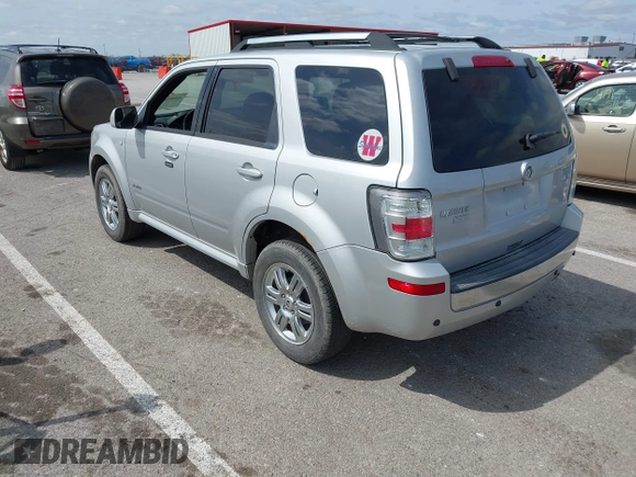 2008 Mercury Mariner Premier with VIN 4M2CU97198KJ12620, listed as a IAAI auction lot 41909389 with 131,884 mi miles and . Bid and sale history available at DreamBid. Image 3.