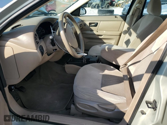 2005 Ford Taurus SE with VIN 1FAFP53U95A101336, listed as a Copart auction lot 56457095 with 127,656 mi miles and Salvage title. Bid and sale history available at DreamBid. Image 7.