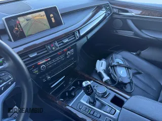 2016 BMW X5 xDrive40e z VIN 5UXKT0C56G0S75145, wystawiony jako Copart lot #57847615 z przebiegiem 101 850 mil mil oraz Tytuł czysty. Historia ofert i sprzedaży dostępna na DreamBid. Obrazek 10.