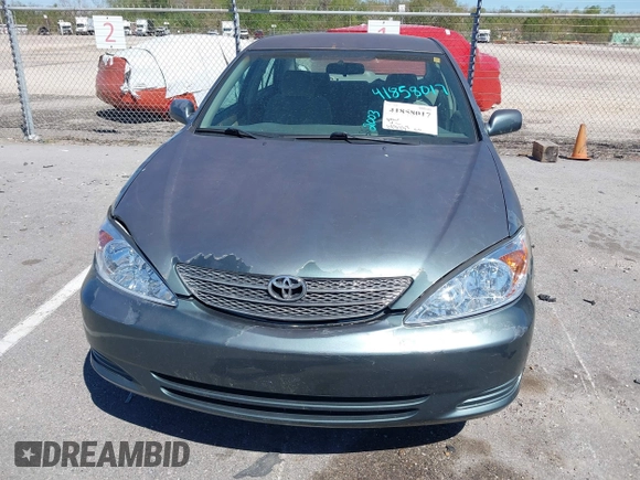2003 Toyota Camry LE with VIN 4T1BE32K43U665972, listed as a IAAI auction lot 41858017 with 143,137 mi miles and . Bid and sale history available at DreamBid. Image 6.