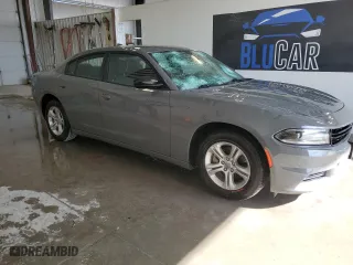2023 Dodge Charger SXT with VIN 2C3CDXBG2PH587879, listed as a Copart auction lot 54262165 with 60,663 mi miles and Salvage Title. Bid and sale history available at carsss.com. Image 4.