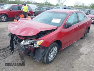 2014 Toyota Camry L with VIN 4T1BF1FK4EU832118, listed as a IAAI auction lot 42165889 with 198,882 mi miles and . Bid and sale history available at DreamBid. Image 2.