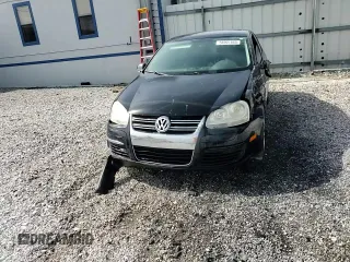 2009 Volkswagen Jetta S z VIN 3VWJM71K39M165677, wystawiony jako Copart lot #56901665 z przebiegiem 202 632 mil mil oraz Czysty tytuł • Clean title. Historia ofert i sprzedaży dostępna na DreamBid. Obrazek 13.