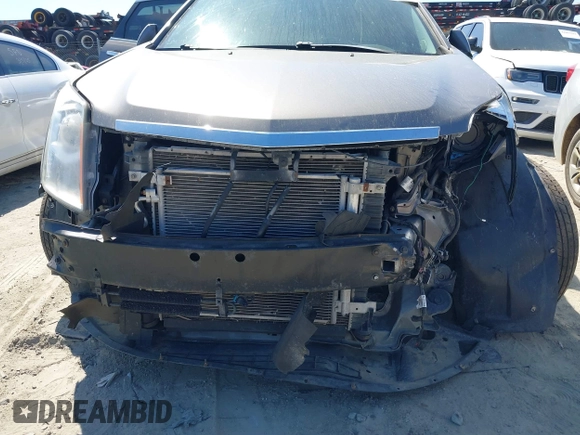2012 Cadillac SRX Luxury Collection with VIN 3GYFNAE36CS509456, listed as a IAAI auction lot 41833647 with 119,931 mi miles and . Bid and sale history available at carsss.com. Image 6.