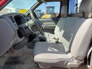 1998 Nissan Frontier XE with VIN 1N6DD21S2WC364538, listed as a Copart auction lot 62867545 with 261,987 mi miles and Salvage title. Bid and sale history available at DreamBid. Image 7.