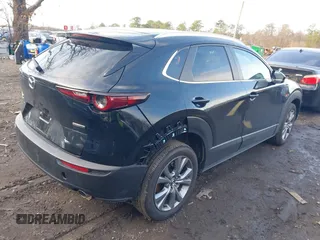 2024 Mazda CX-30 S Preferred z VIN 3MVDMBCM4RM681739, wystawiony jako IAAI lot #41788291 z przebiegiem 7 757 mil mil oraz . Historia ofert i sprzedaży dostępna na DreamBid. Obrazek 4.