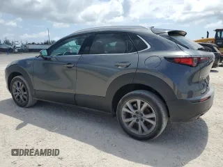 2024 Mazda CX-30 S Premium z VIN 3MVDMBDM4RM615609, wystawiony jako Copart lot #57761055 z przebiegiem 20 721 mil mil oraz Szkoda całkowita • Salvage title. Historia ofert i sprzedaży dostępna na DreamBid. Obrazek 2.