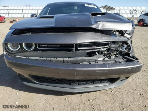 2021 Dodge Challenger SXT with VIN 2C3CDZAG1MH623506, listed as a Copart auction lot 44610625 with 66,837 mi miles and Salvage Title. Bid and sale history available at carsss.com. Image 5.