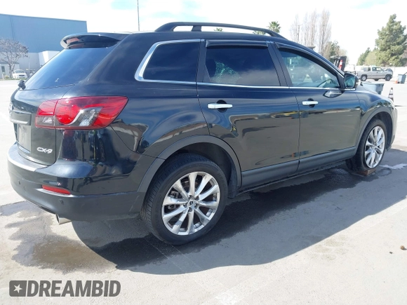 2015 Mazda CX-9 Grand Touring z VIN JM3TB2DA4F0450014, wystawiony jako IAAI lot #41692935 z przebiegiem 90 800 mil mil oraz . Historia ofert i sprzedaży dostępna na DreamBid. Obrazek 4.