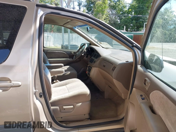 2002 Toyota Sienna LE with VIN 4T3ZF13C82U465335, listed as a IAAI auction lot 40274809 with 178,560 mi miles and . Bid and sale history available at DreamBid. Image 5.