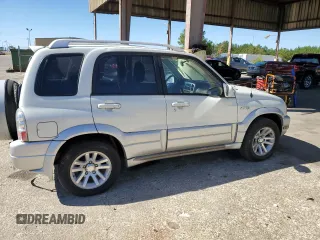 2004 Suzuki Grand Vitara z VIN JS3TE62V544100024, wystawiony jako Copart lot #75613324 z przebiegiem Nie podano mil oraz Czysty tytuł • Clean title. Historia ofert i sprzedaży dostępna na DreamBid. Obrazek 3.