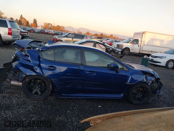2017 Subaru WRX Limited with VIN JF1VA1L61H9800215, listed as a IAAI auction lot 40802029 with 83,099 mi miles. Bid and sale history available at carsss.com. Image 12.