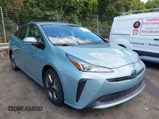 2019 Toyota Prius L Eco z VIN JTDKARFU8K3095669, wystawiony jako IAAI lot #42334160 z przebiegiem 59 882 mil mil oraz . Historia ofert i sprzedaży dostępna na DreamBid. Obrazek 1.