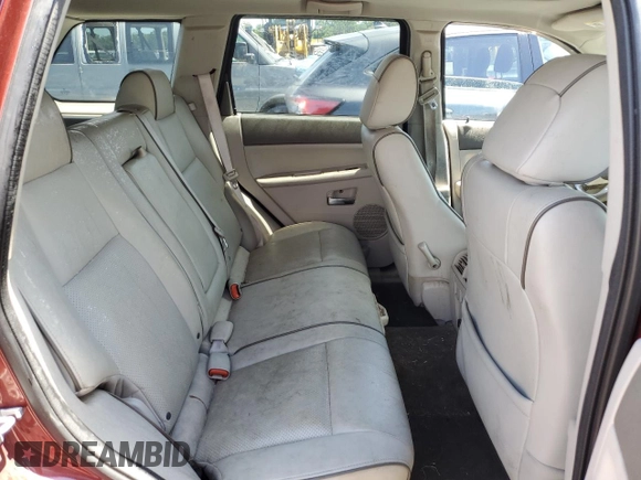 2009 Jeep Grand Cherokee with VIN 1J8HR68T29C512518, listed as a Copart auction lot 58894174 with 113,181 mi miles and Salvage title. Bid and sale history available at DreamBid. Image 11.