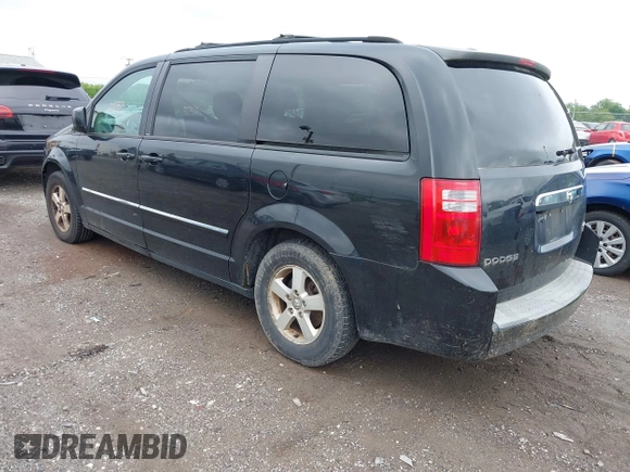 2009 Dodge Grand Caravan SXT z VIN 2D8HN54109R596185, wystawiony jako IAAI lot #42382133 z przebiegiem 207 882 mil mil oraz . Historia ofert i sprzedaży dostępna na DreamBid. Obrazek 3.