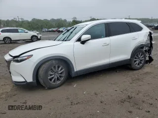 2021 Mazda CX-9 Touring with VIN JM3TCBCY1M0517709, listed as a Copart auction lot 57624945 with 64,081 mi miles and Salvage title. Bid and sale history available at DreamBid. Image 1.