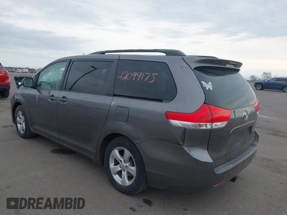 2011 Toyota Sienna LE AAS with VIN 5TDKK3DC3BS077857, listed as a IAAI auction lot 42099175 with 283,777 mi miles and . Bid and sale history available at DreamBid. Image 3.