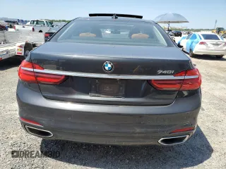 2017 BMW 7 Series 740i z VIN WBA7E2C30HG741105, wystawiony jako Copart lot #56632005 z przebiegiem 95 162 mil mil oraz Czysty tytuł • Clean title. Historia ofert i sprzedaży dostępna na DreamBid. Obrazek 6.