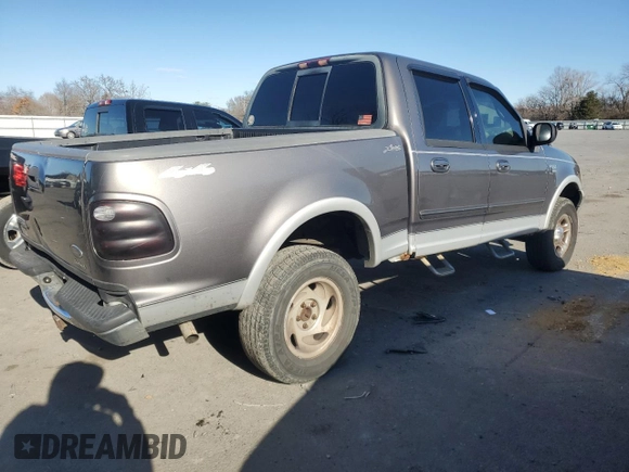 2002 Ford F-150 XLT with VIN 1FTRW08L62KB73629, listed as a Copart auction lot 83571304 with 201,816 mi miles and Salvage Title. Bid and sale history available at carsss.com. Image 3.