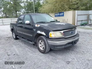 2002 Ford F-150 XLT with VIN 1FTRW07612KD59994, listed as a IAAI auction lot 41948335 with 1 mi miles. Bid and sale history available at carsss.com. Image 1.